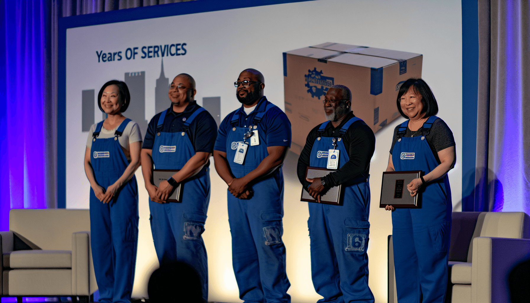 A recognition ceremony for long-serving movers